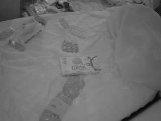 voyeurcam-julmodels-whitebed-1 webcam model stream image