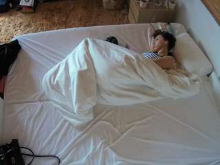 voyeurcam-julmodels-whitebed-3 webcam model stream image